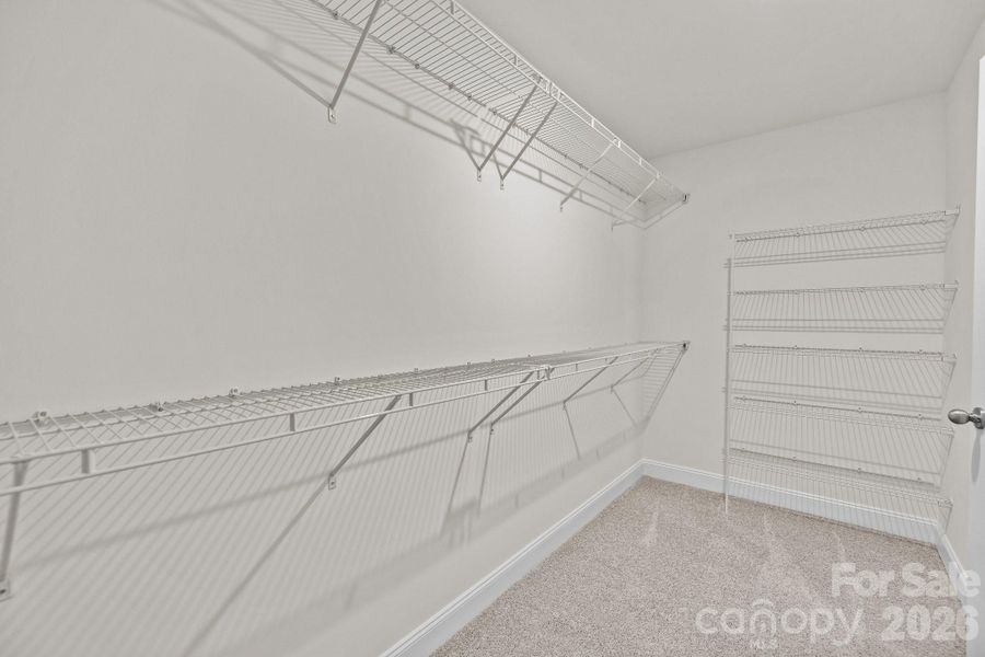Primary ClosetPhotos are representative and may not reflect the exact home, finishes, or features.