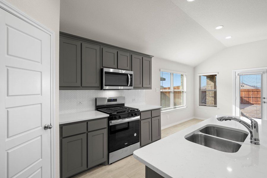 Representative exterior photo of a completed home built from the Cheyenne by Impression Homes in ValleyBrooke, Mesquite, TX (Image 9).