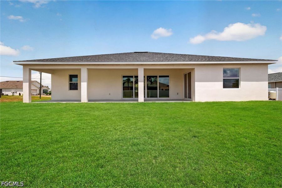 Exterior details and patio area of a home in Cape Coral, Cape Coral (Image 3).
