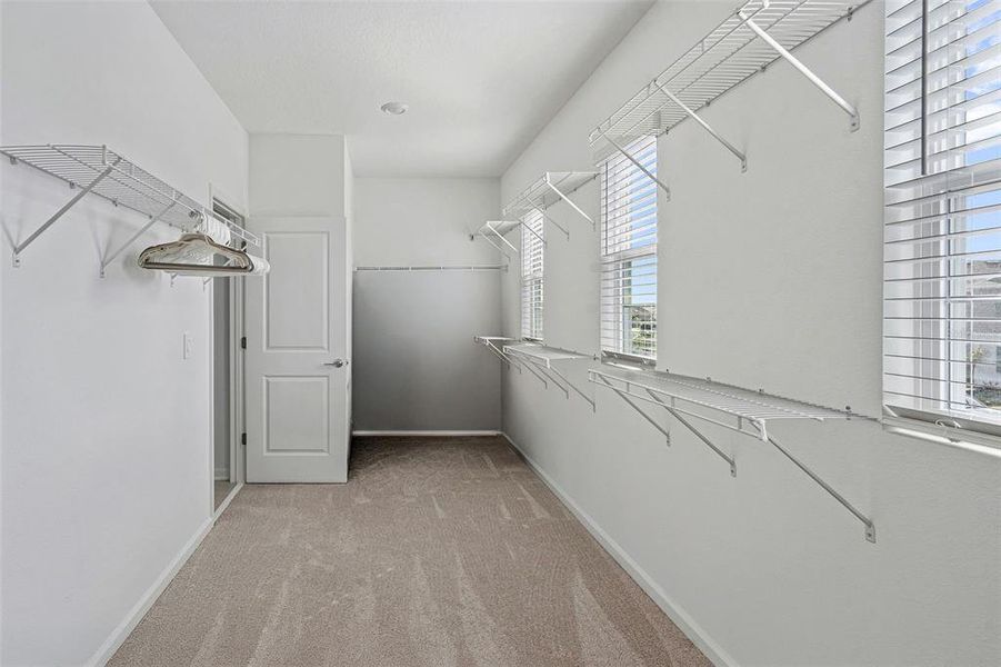 Spacious, unfurnished interior of a new home in Wellness Ridge, Clermont (Image 55).