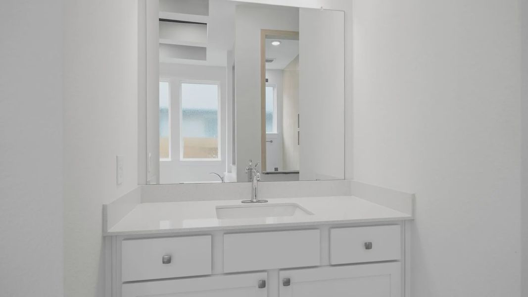 Close-up of interior finishes inside a home in Lakes of Cane Island, Katy (Image 12).