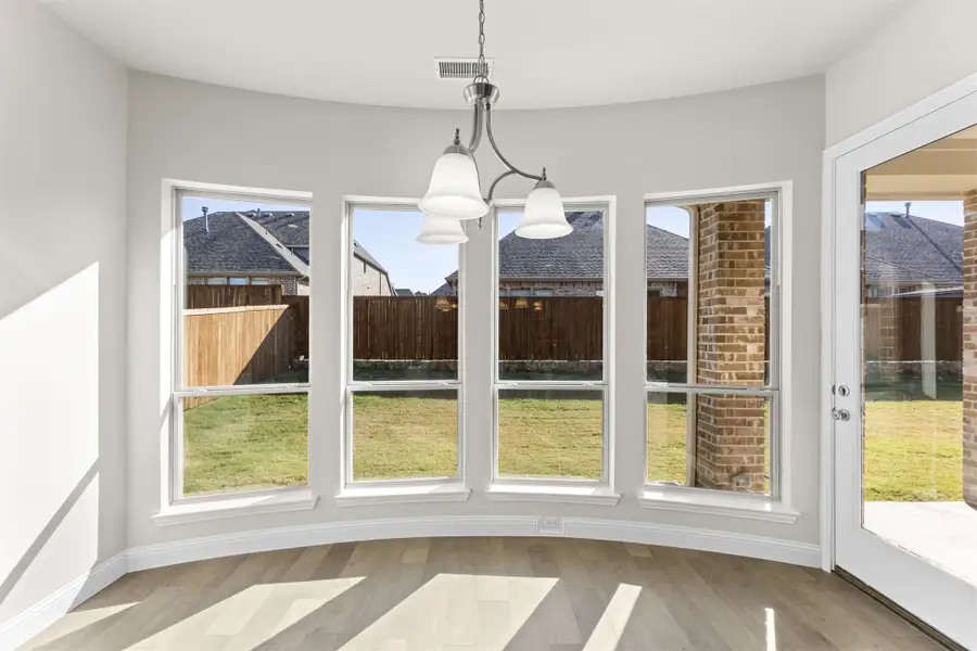 Representative unfurnished interior of a home built from the Portsmouth by Windsor Homes in Nelson Lake Estates, Rockwall (Image 24).