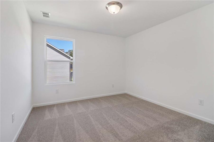 Spacious, unfurnished interior of a new home in The Pointe at Heron Bay, Locust Grove (Image 26).