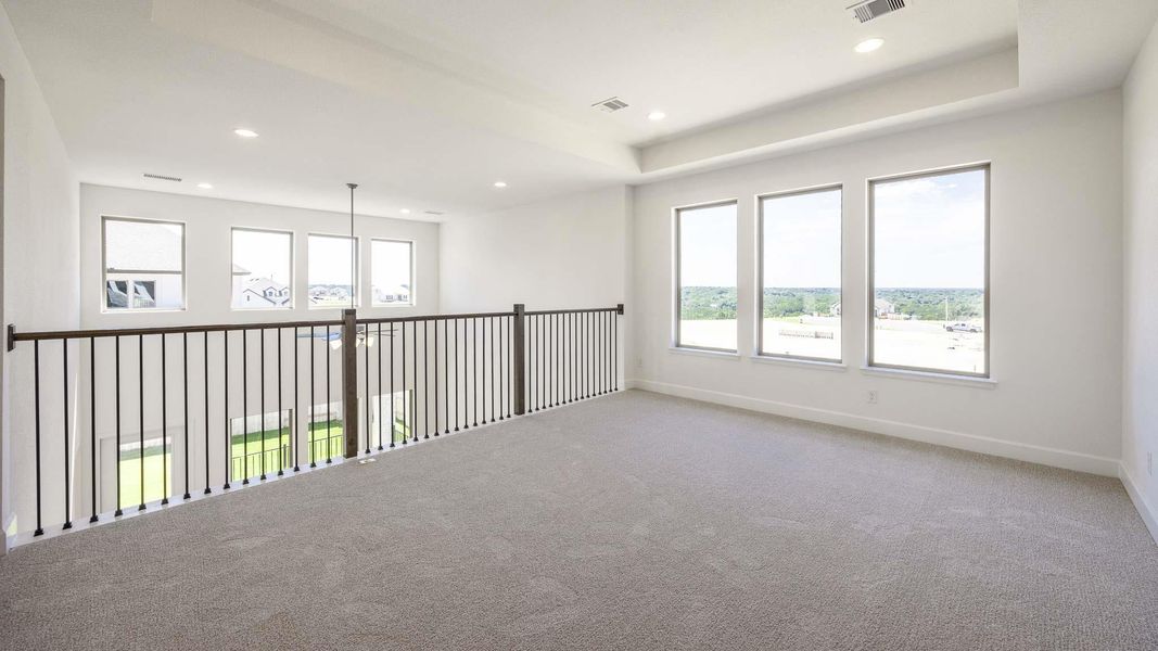Spacious, unfurnished interior of a new home in Lariat 45', Liberty Hill (Image 10). Spacious, unfurnished interior of a new home in Lariat 45', Liberty Hill (Image 10).