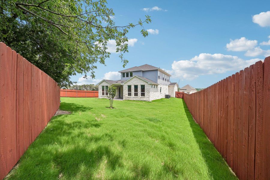 Exterior details and patio area of a home in Sauls Ranch, Round Rock (Image 4).
