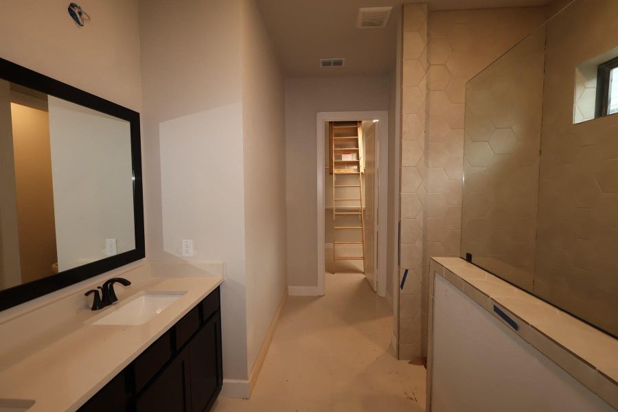Furnished interior view inside a new home in Sienna - Landmark Row Collection, Missouri City (Image 6).