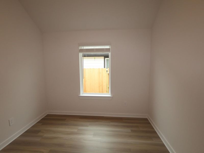 Spacious, unfurnished interior of a new home in Pinewood at Grand Texas, New Caney (Image 10).