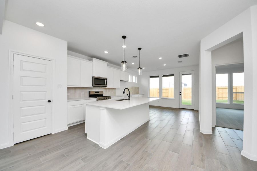 Furnished interior view inside a new home in Elyson, Katy (Image 9).