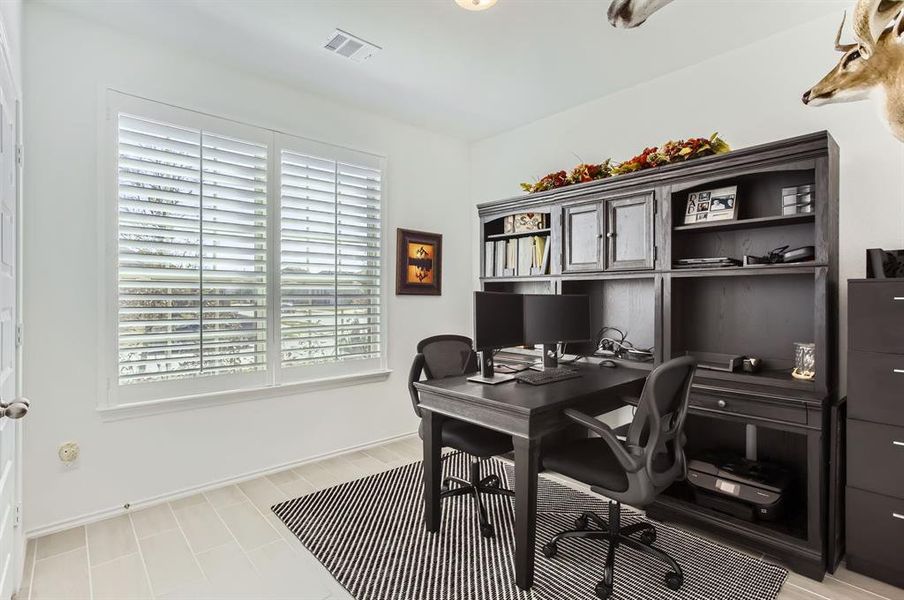 The home has a secondary bedroom downstairs with a full bathroom right next door.  Perfect guest room for visiting relatives!