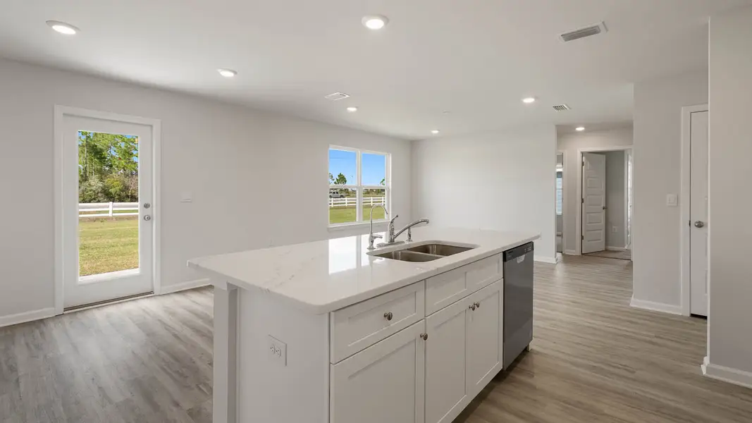 Furnished interior view inside a new home in Magnolia at the Bluffs Phase 3, Freeport (Image 4).