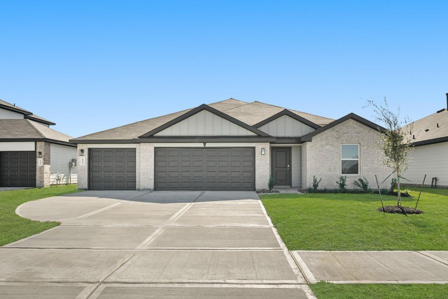 Front exterior of a new home in Medina, Dayton, TX, highlighting curb appeal (Image 6).