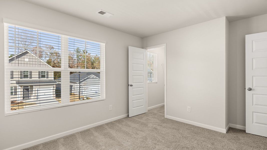 Representative unfurnished interior of a home built from the Plan by D.R. Horton in WillowBrook, Winder (Image 21).