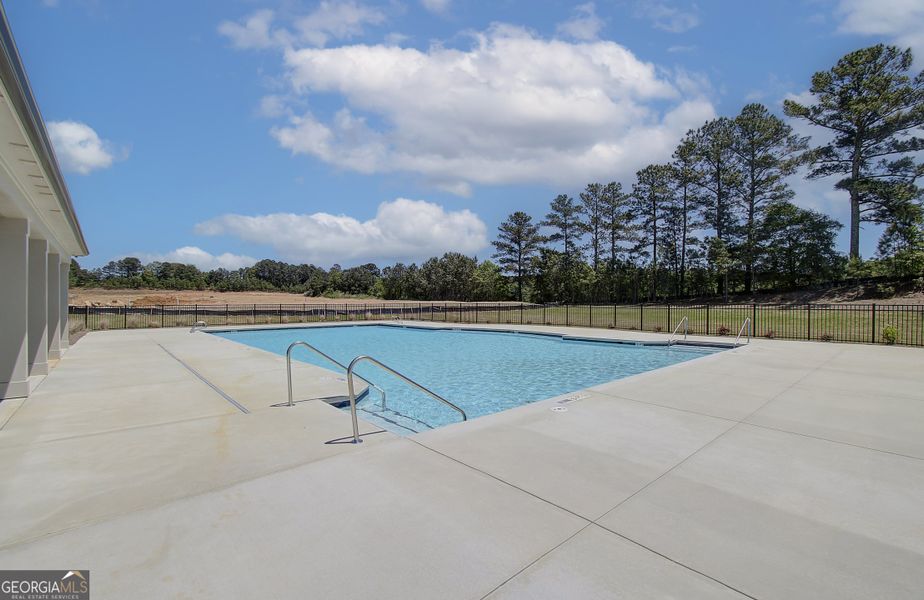 Front exterior of a new home in Enclave at Logan Point, Loganville, GA, highlighting curb appeal (Image 18).