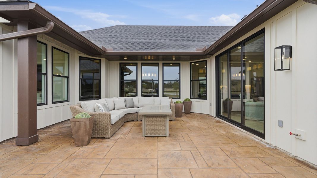 Exterior details and patio area of a home in Lakeside at Millican Reserve, College Station (Image 25).