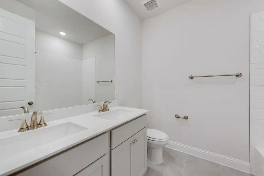 Furnished interior view inside a new home in Valencia On The Lake, Little Elm (Image 8).