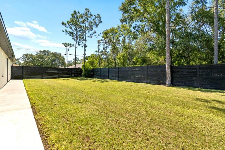 Exterior details and patio area of a home in , Spring Hill (Image 44).