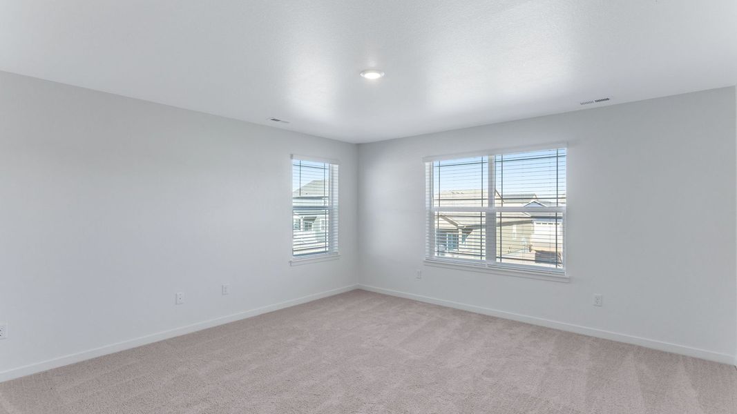 Representative unfurnished interior of a home built from the Calhan by D.R. Horton in Vantage, Berthoud (Image 20).