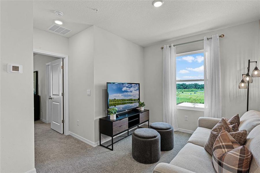 Furnished interior view inside a new home in Nona West, Orlando (Image 20). Furnished interior view inside a new home in Nona West, Orlando (Image 20).