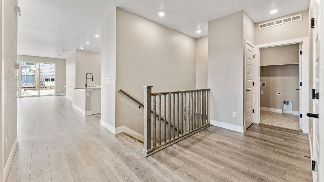 Representative unfurnished interior of a home built from the Pike by Taylor Morrison in The Aurora Highlands Town Collection, Aurora (Image 23).