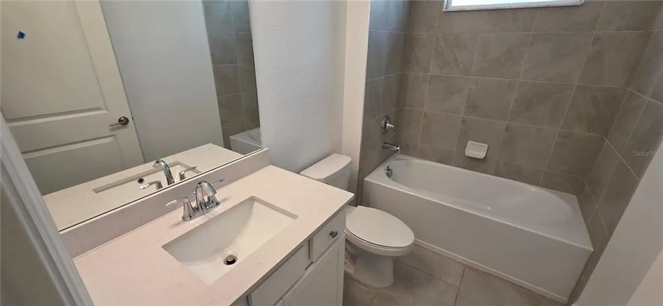 Furnished interior view inside a new home in Rye Ranch: Manor Homes, Parrish (Image 6).