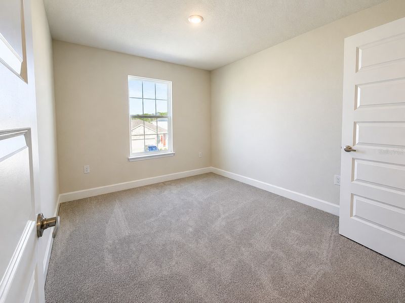 Spacious, unfurnished interior of a new home in Harmony Central, Harmony (Image 9).