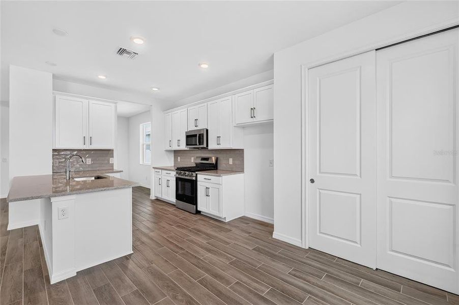 Furnished interior view inside a new home in The Sanctuary – Resort Collection, Punta Gorda (Image 10).
