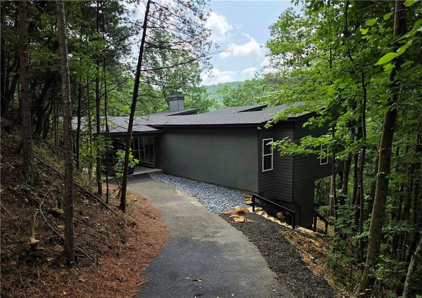 Exterior details and patio area of a home in , Ellijay (Image 15).