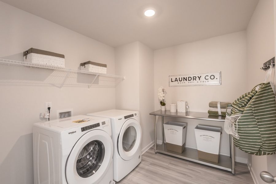 Complete your chores with ease in this large laundry space.