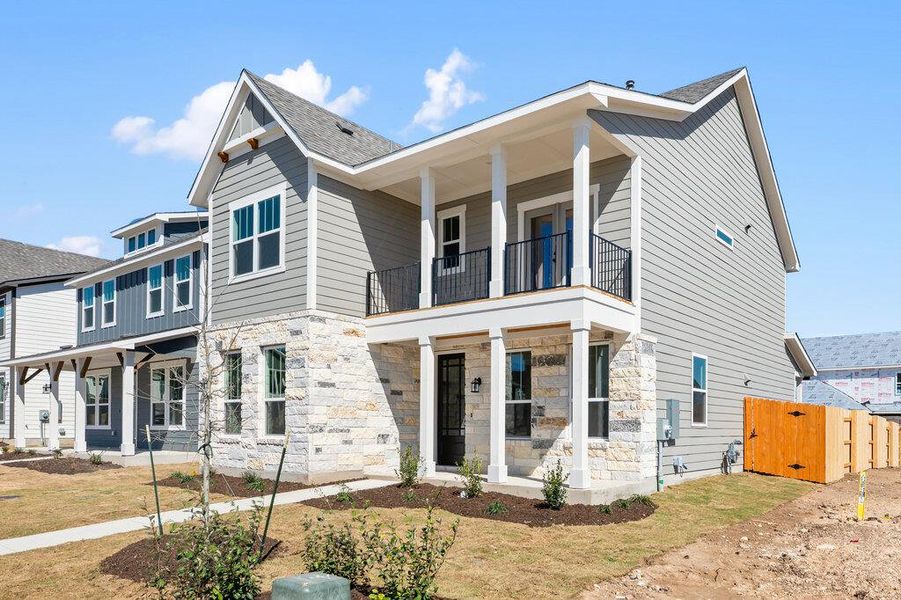 Exterior details and patio area of a home in Lariat, Liberty Hill (Image 29).