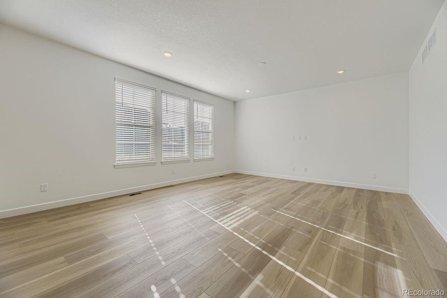 Spacious, unfurnished interior of a new home in Newlin Crossing: The Monarch Collection, Parker (Image 17).