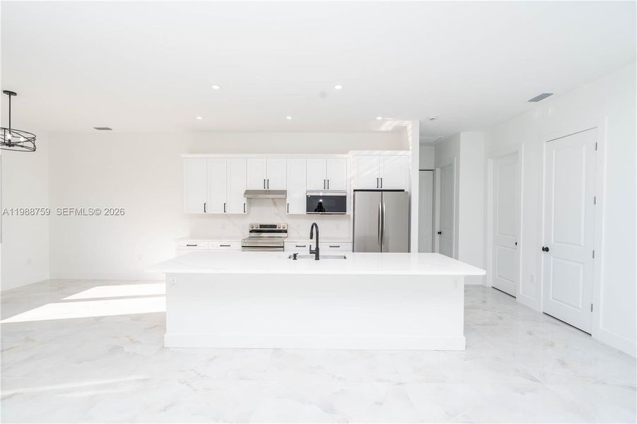 Furnished interior view inside a new home in , Lehigh Acres (Image 5). Furnished interior view inside a new home in , Lehigh Acres (Image 5).