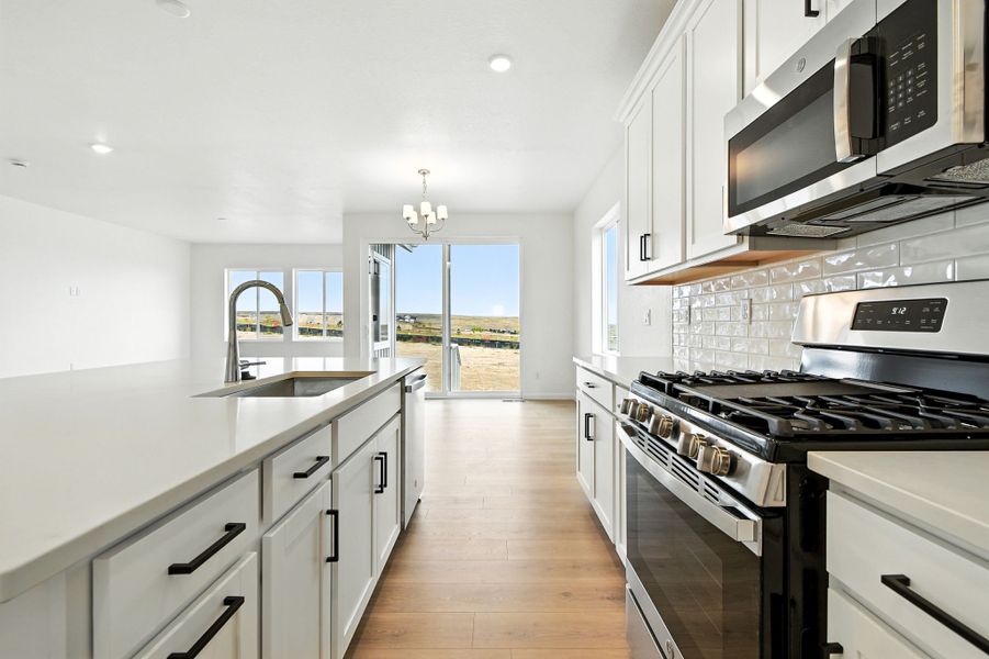 Furnished interior view inside a new home in Trailstone, Arvada (Image 6).