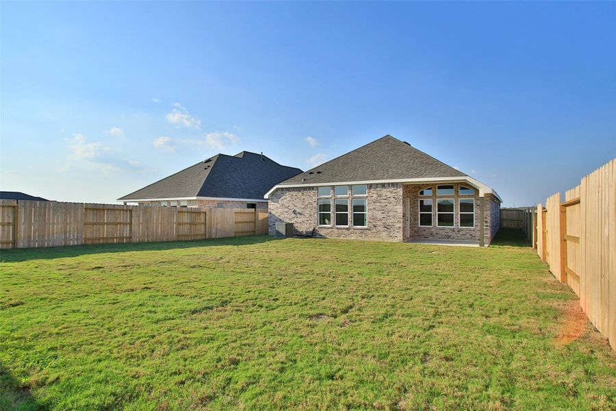 Exterior details and patio area of a home in Creekhaven, Arcola (Image 3).
