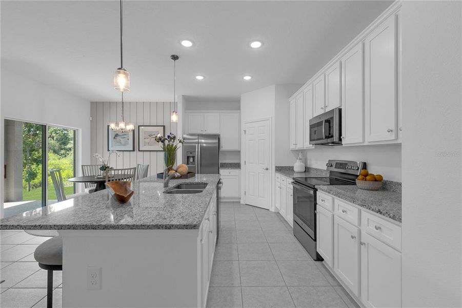 Furnished interior view inside a new home in Covered Bridge at Liberty Bluff, Haines City (Image 24).