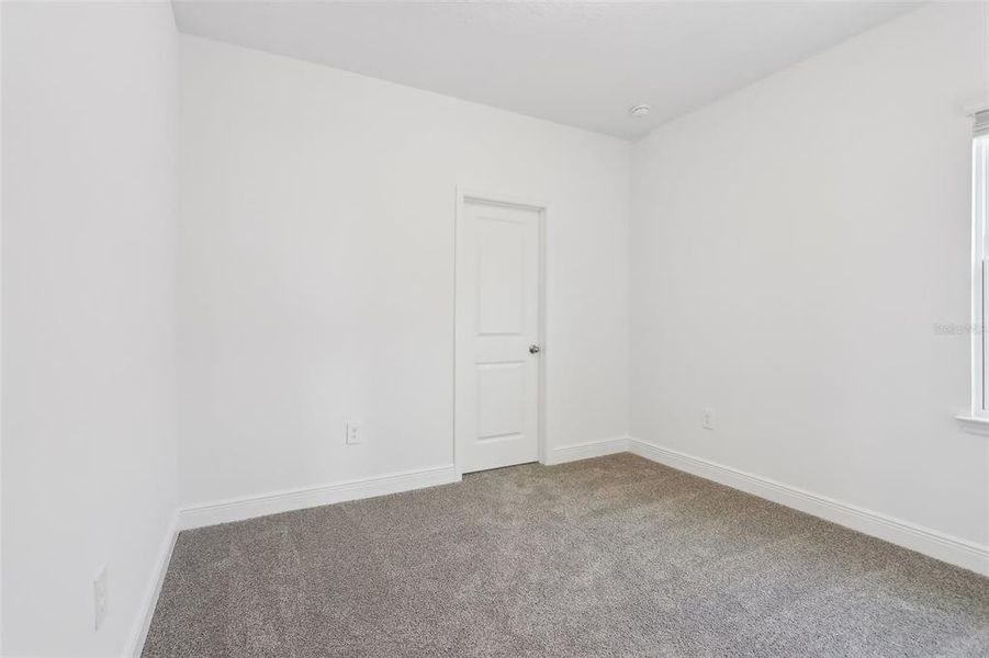 Spacious, unfurnished interior of a new home in Cyrene at Minneola - Villas, Montverde (Image 22).