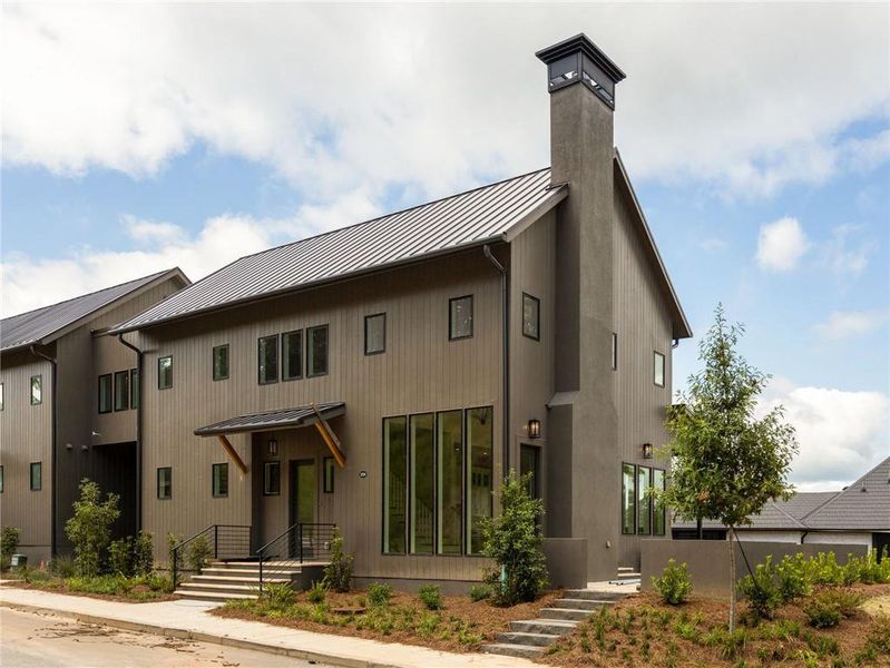 Front exterior of a new home in , Chattahoochee Hills, GA, highlighting curb appeal (Image 20).