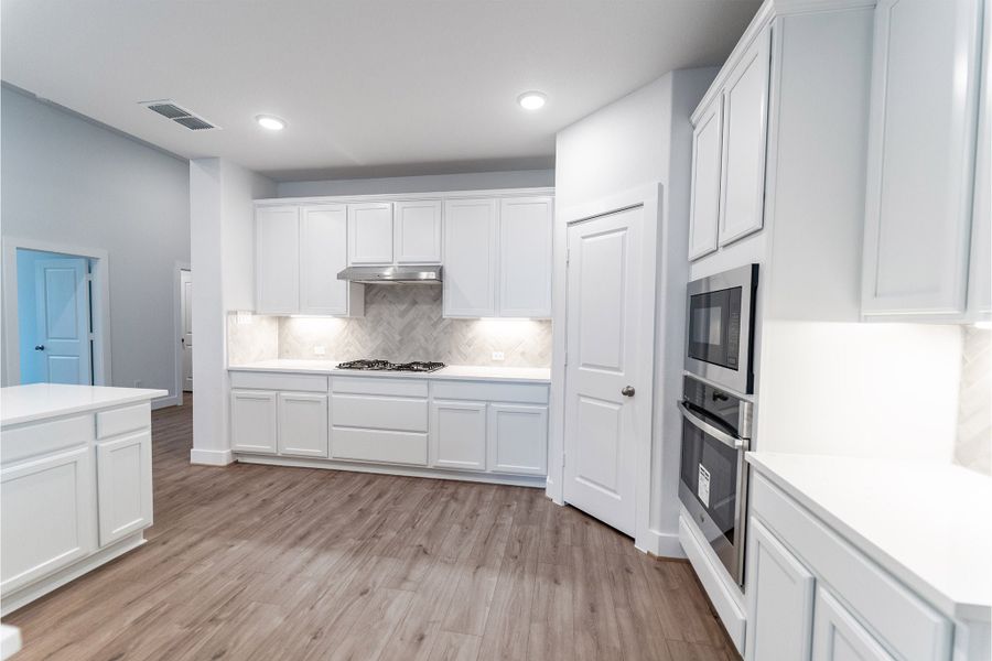 Furnished interior view inside a new home in Sunfield, Buda (Image 3).