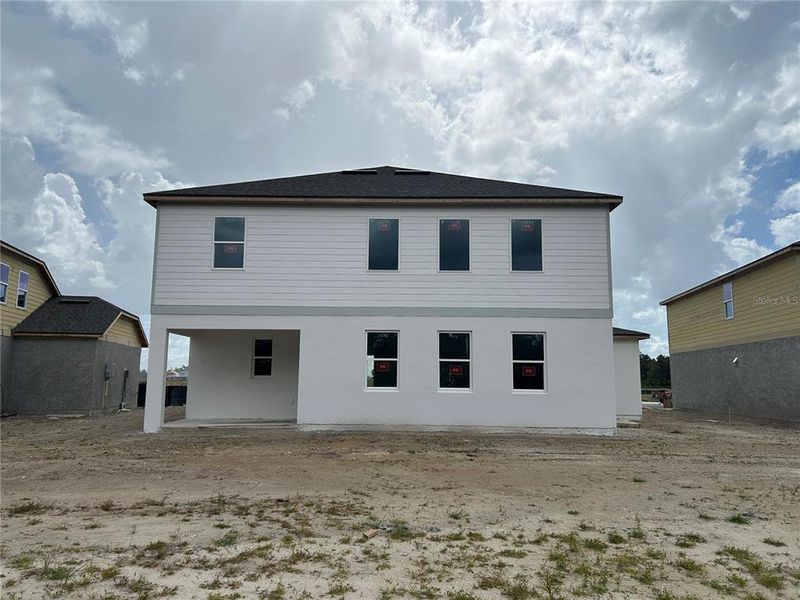 In-progress construction of a new home in Oakfield Trails Signature, Parrish, FL (Image 6).
