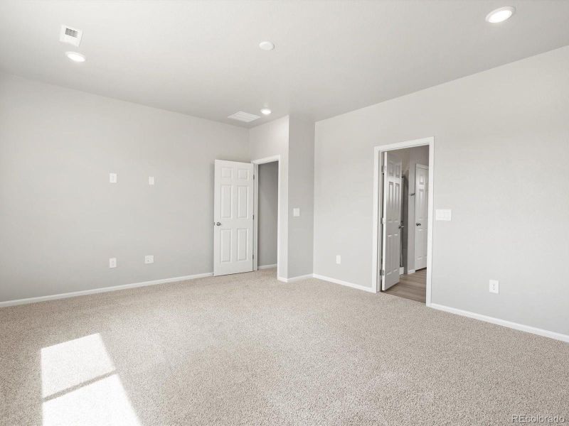 Spacious, unfurnished interior of a new home in Poudre Heights: The Alpine Collection, Windsor (Image 14).