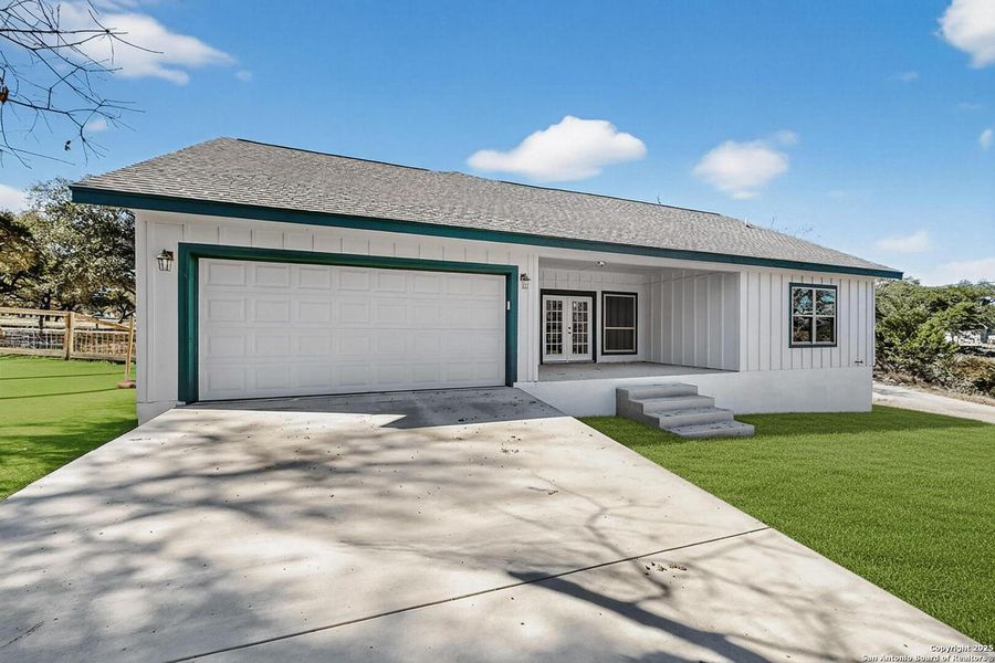 Exterior details and patio area of a home in , Spring Branch (Image 28).