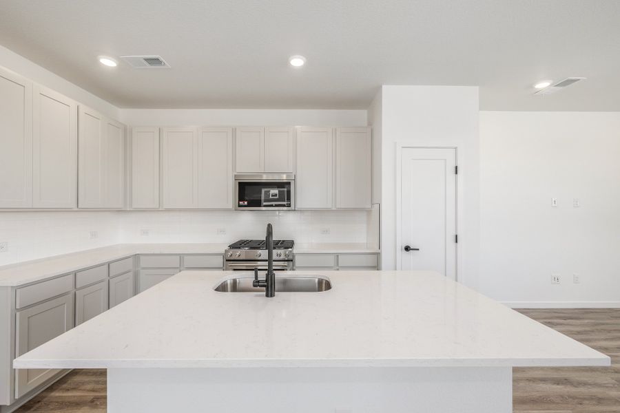 Furnished interior view inside a new home in Painted Prairie, Aurora (Image 10).