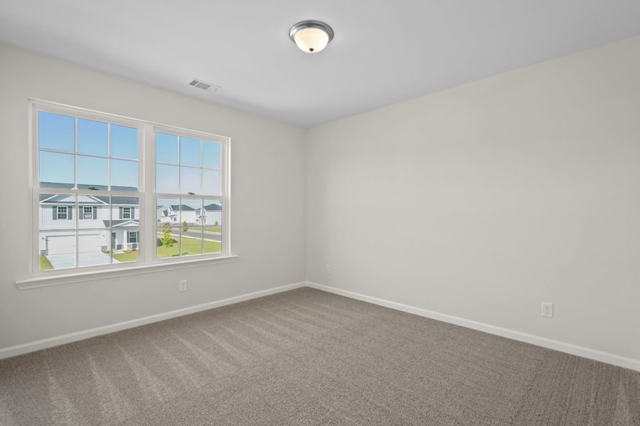 Representative unfurnished interior of a home built from the The Anderson by RTS Homes in Doctor's Creek, Ludowici (Image 35).