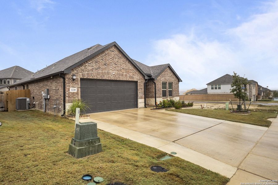 Front exterior of a new home in , San Antonio, TX, highlighting curb appeal (Image 2). Front exterior of a new home in , San Antonio, TX, highlighting curb appeal (Image 2).