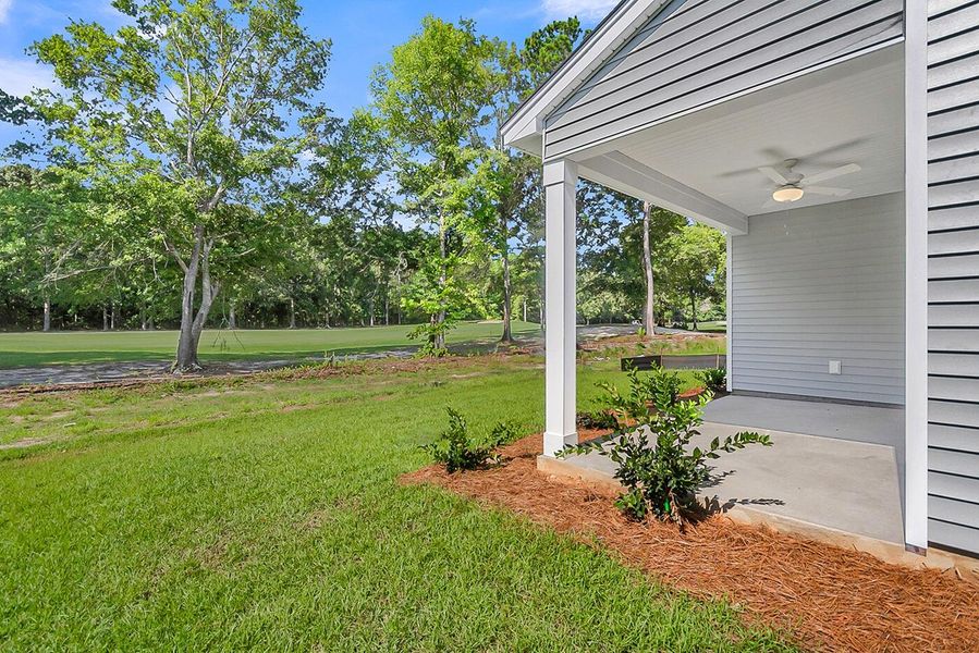 Exterior details and patio area of a home in Fairway Woods at Wyboo, Manning (Image 4).