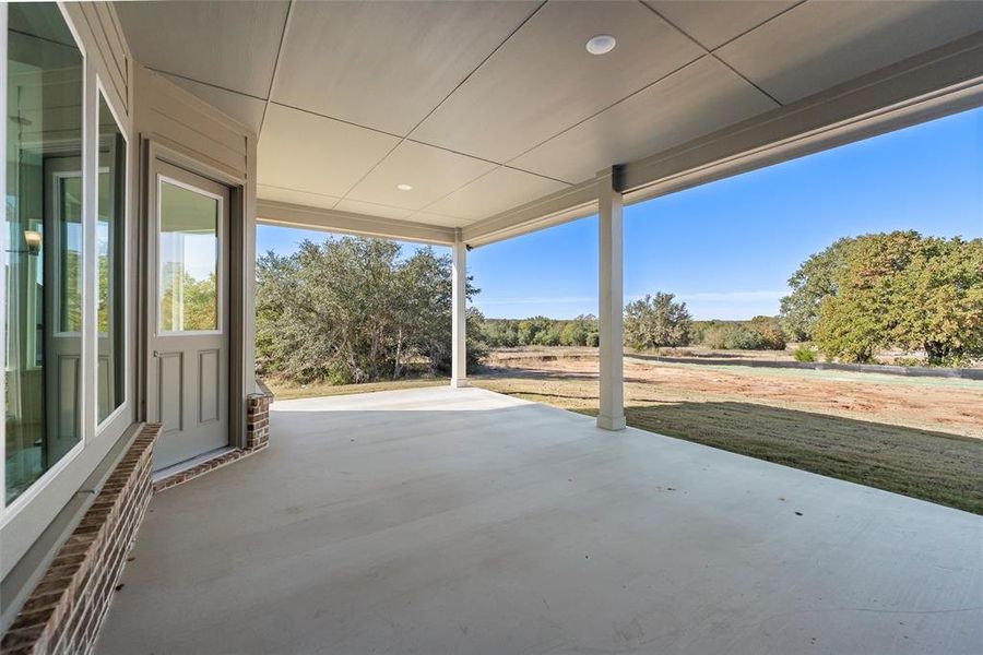 Exterior details and patio area of a home in Oak Grove Addition, Springtown (Image 3).