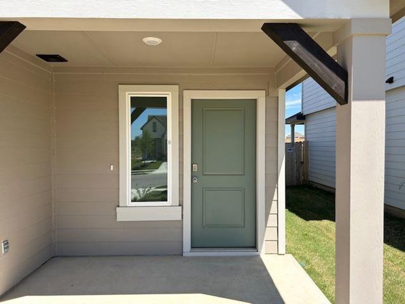 Exterior details and patio area of a home in Cornerstone, Rockdale (Image 8).
