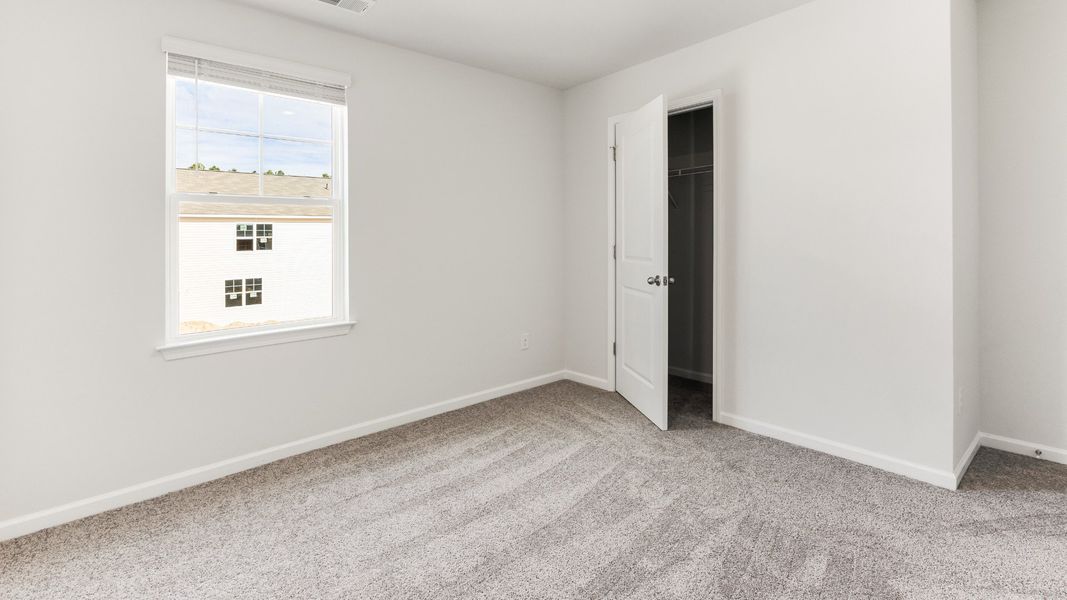 Representative unfurnished interior of a home built from the HAYDEN by D.R. Horton in Sidbury Station, Castle Hayne (Image 27).