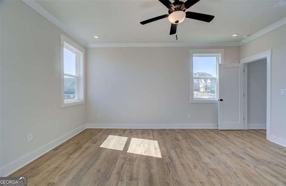 Spacious, unfurnished interior of a new home in The Paddocks at Doc Hughes, Buford (Image 32).