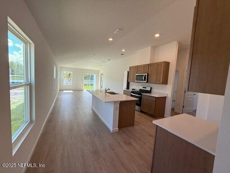 Furnished interior view inside a new home in Grand Reserve, Bunnell (Image 6).