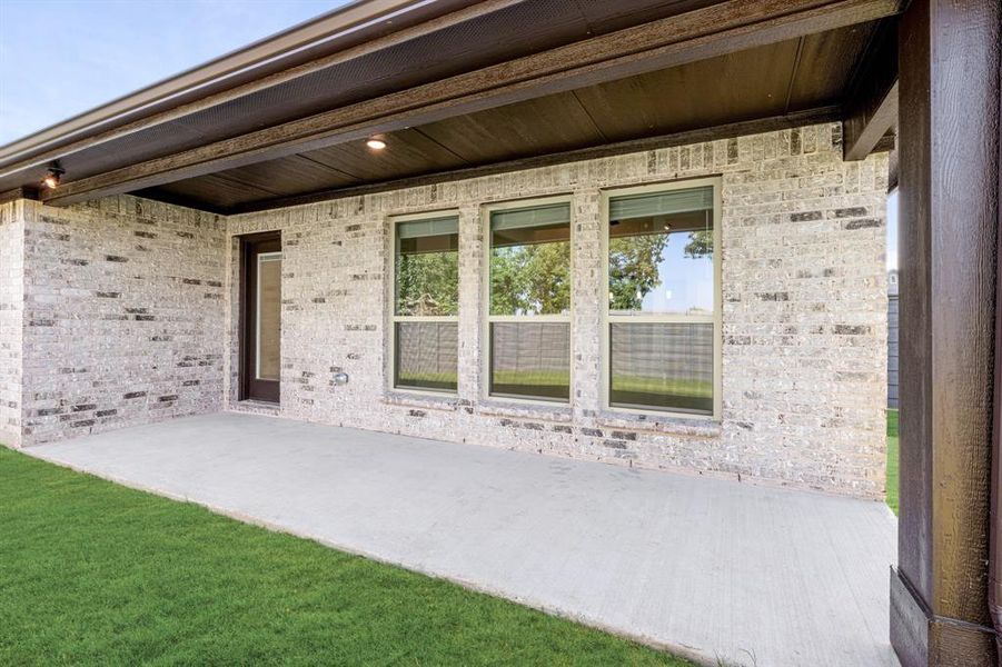 Front exterior of a new home in Union Park Classic 60, Little Elm, TX, highlighting curb appeal (Image 2). Front exterior of a new home in Union Park Classic 60, Little Elm, TX, highlighting curb appeal (Image 2).